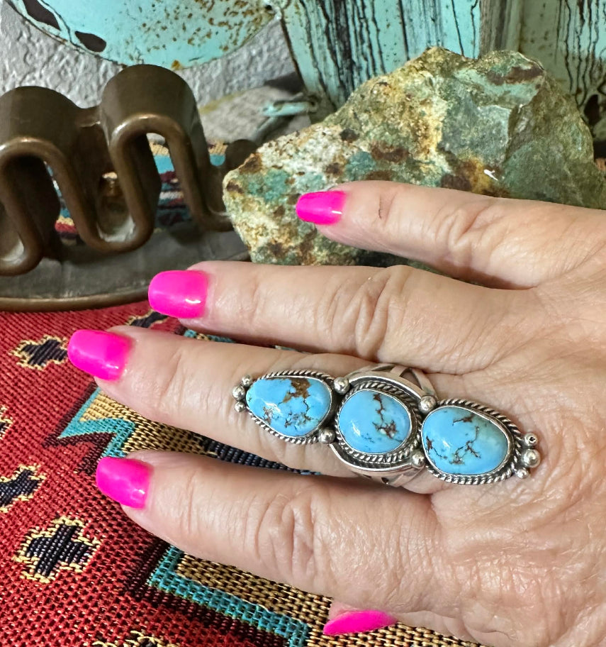 Golden Hills Turquoise Three Stone Ring by Navajo artist E.M. Linkin - worn on hand