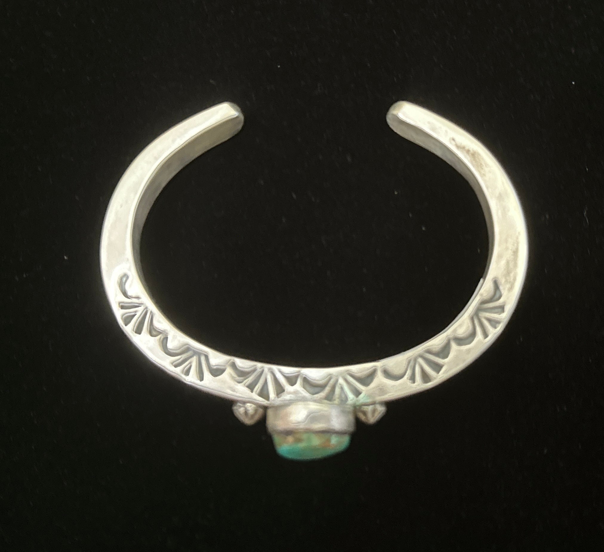 Navajo sterling silver teardrop turquoise cuff bracelet with star shot detailing – side view | Rockin' M Leathers