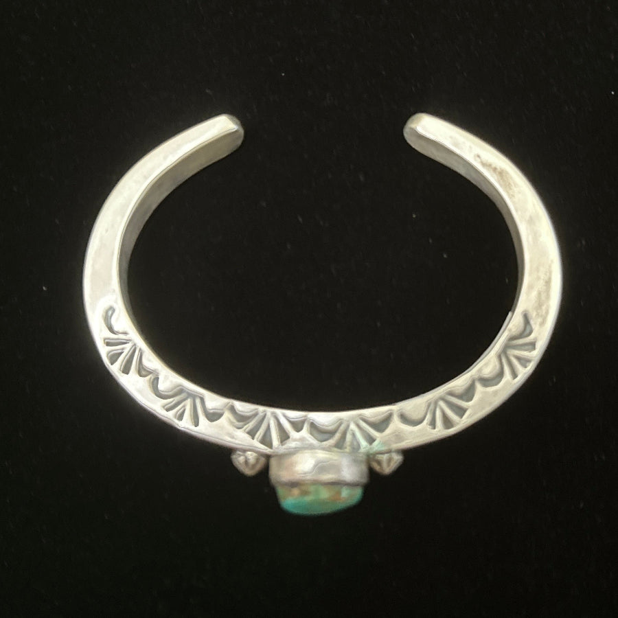 Navajo sterling silver teardrop turquoise cuff bracelet with star shot detailing – Hallmarked Tahe side view
