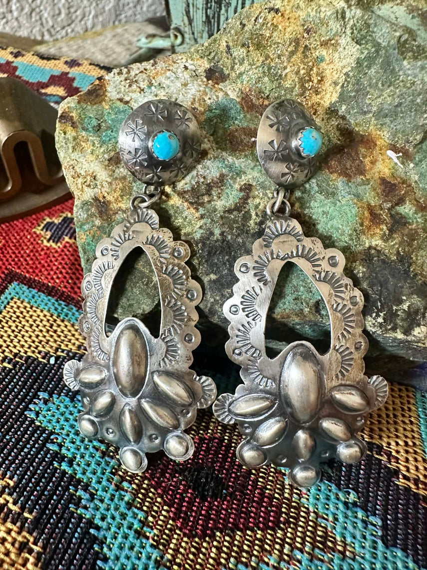Sterling Silver and Turquoise Repoussé Post Dangle Earrings by Navajo artist T. Yazzie - front view